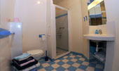 Private bathroom with shower and toilet